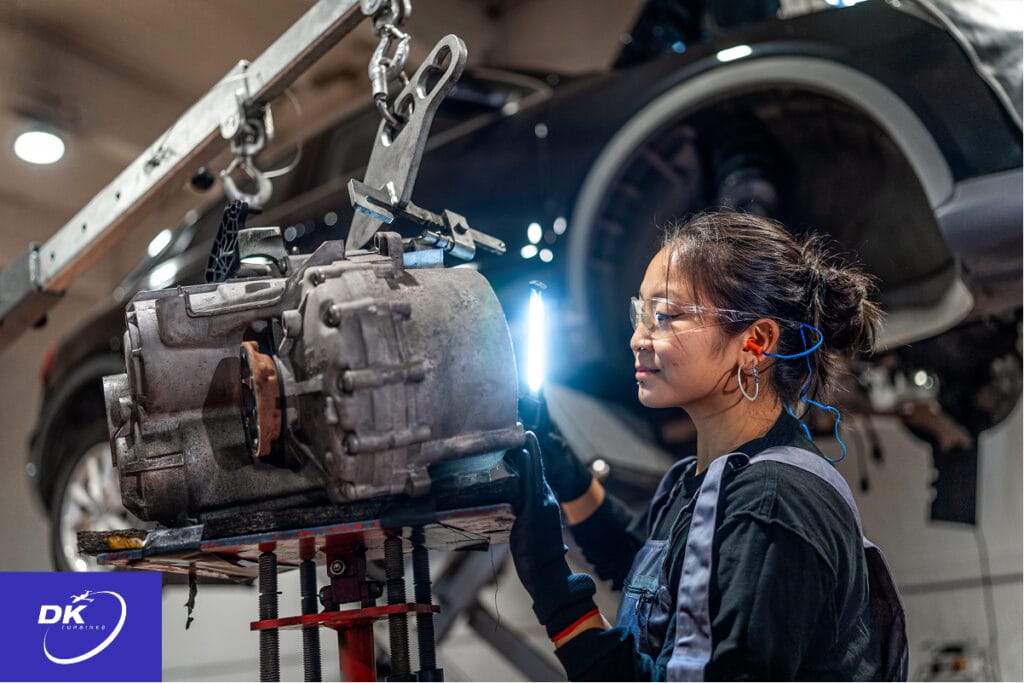 Engineer exemplifying the human element in testing as she inspects an aircraft component for reliability and performance in a high-tech facility.